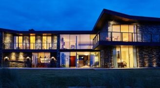 sand dunes luxury new build home in Cornwall with a glazing package from IQ Glass including floor to ceiling sliding glass doors