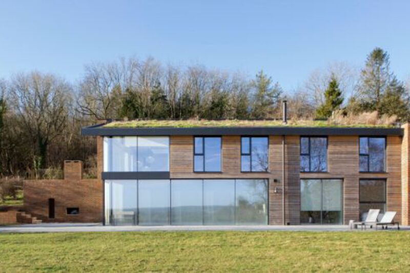 modern new build biophilic design with timber cladding and bespoke glazing